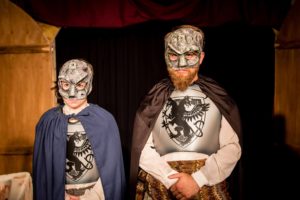 Juliana Brecher and Justin Verstraete as the Hapsberg Lords. Masks and lighting by Benjamin Dionysus. Costumes by Delena Bradley. Photo by iNDie Grant Productions